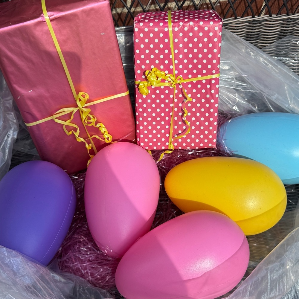 Jumbo Easter eggs and display presents and pink grass decorations Easter display